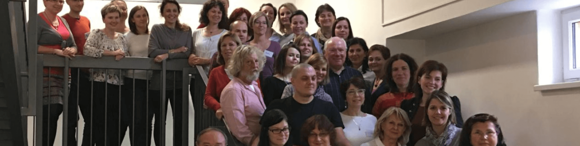 a group of people posing for a photo