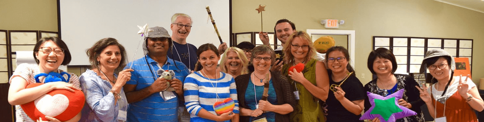 a group of people holding toys