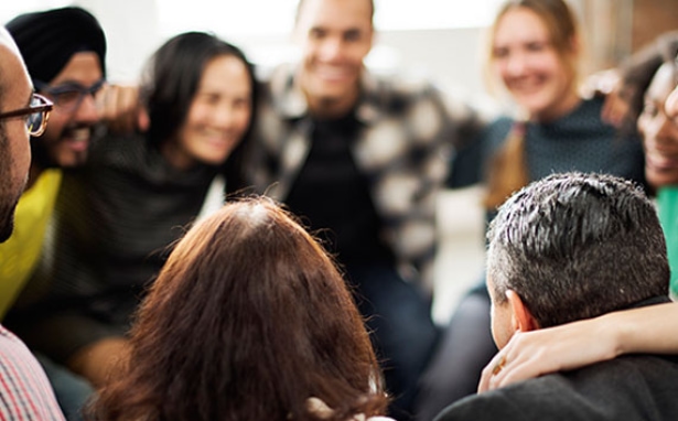 a group of people in a circle